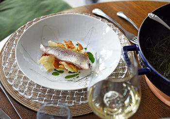 WHITEFISH BAKED ON HAY WITH MASHED POTATOES, FRIED POTATOES, BUTTERMILK AND ALPINE MILK